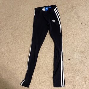 Adidas black leggings with strips on the side